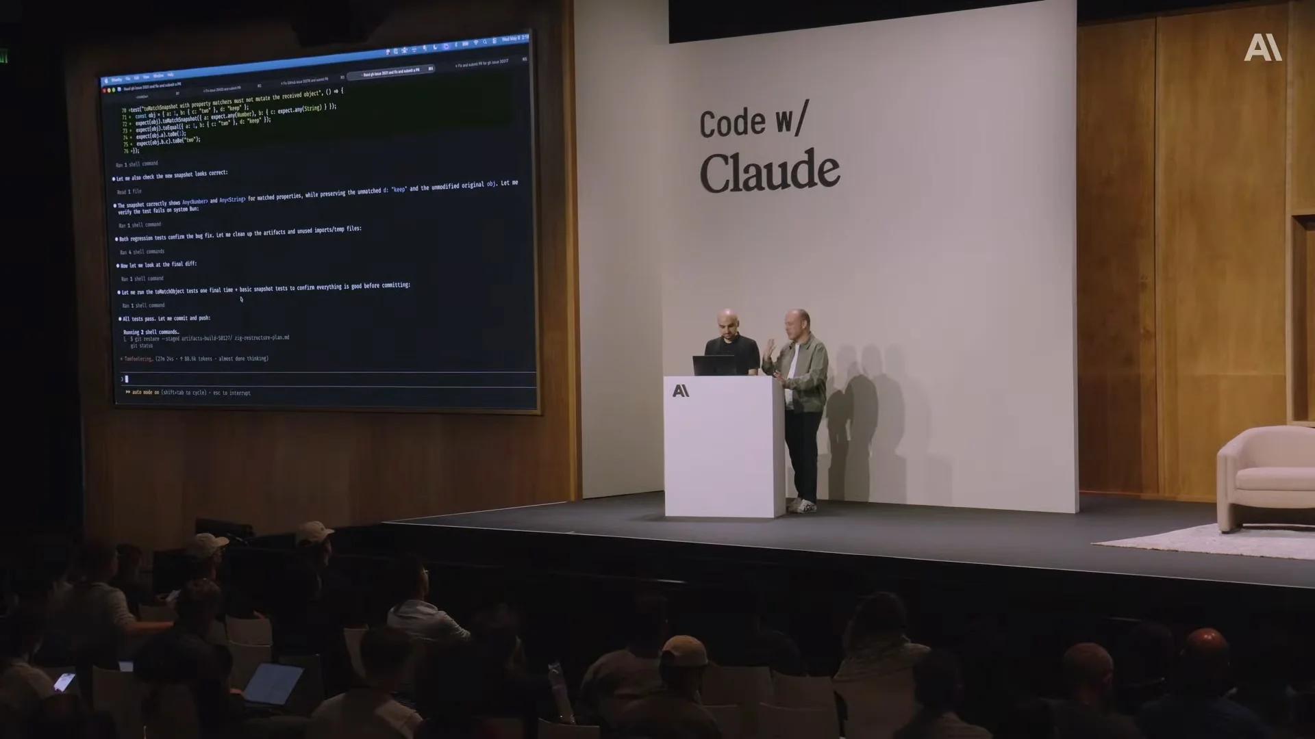 Boris Cherny and Jarred Sumner live coding on stage at Code w/ Claude in San Francisco