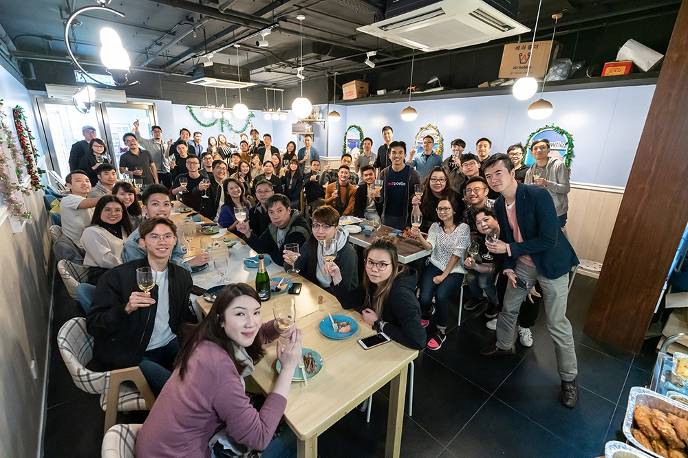 Bowtie team gathered together in a company photograph