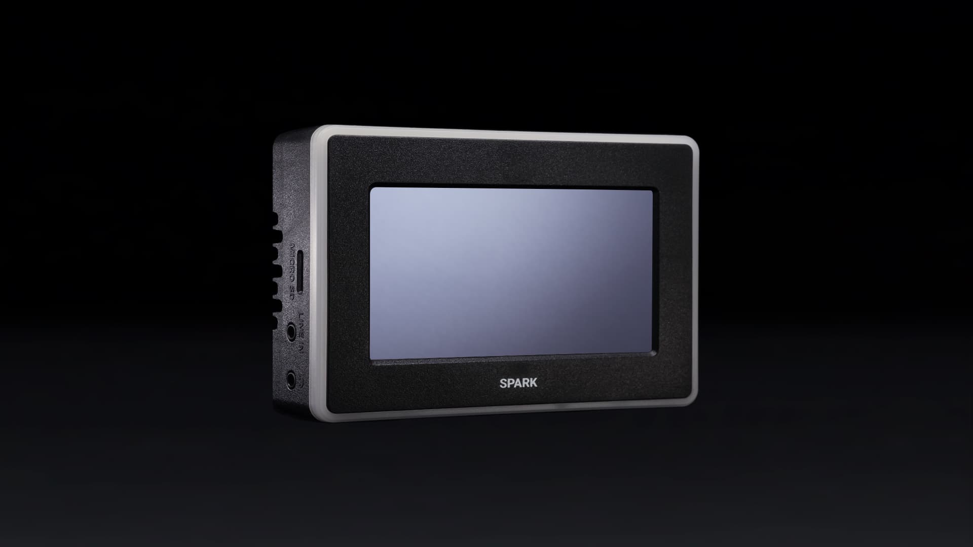 BoxCast Spark touchscreen HEVC encoder on a dark studio background