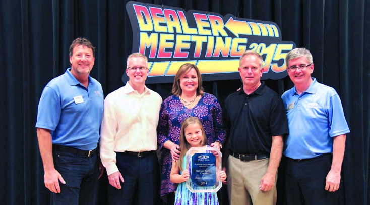 Brad Gates, second from left, with Nautic colleagues and Freeway Sports Center representatives at a dealer award presentation