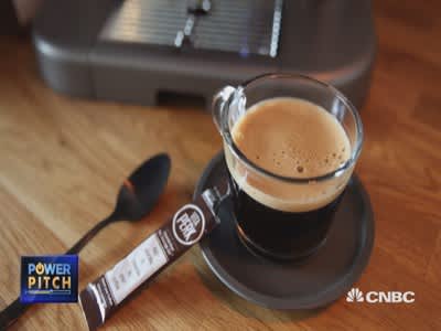 A cup of coffee with a VitaPerk packet in a 2015 CNBC Power Pitch still