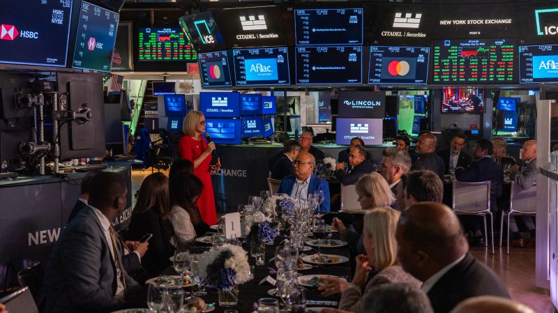 Guests seated for a Biz2X and Biz2Credit dinner on the New York Stock Exchange floor