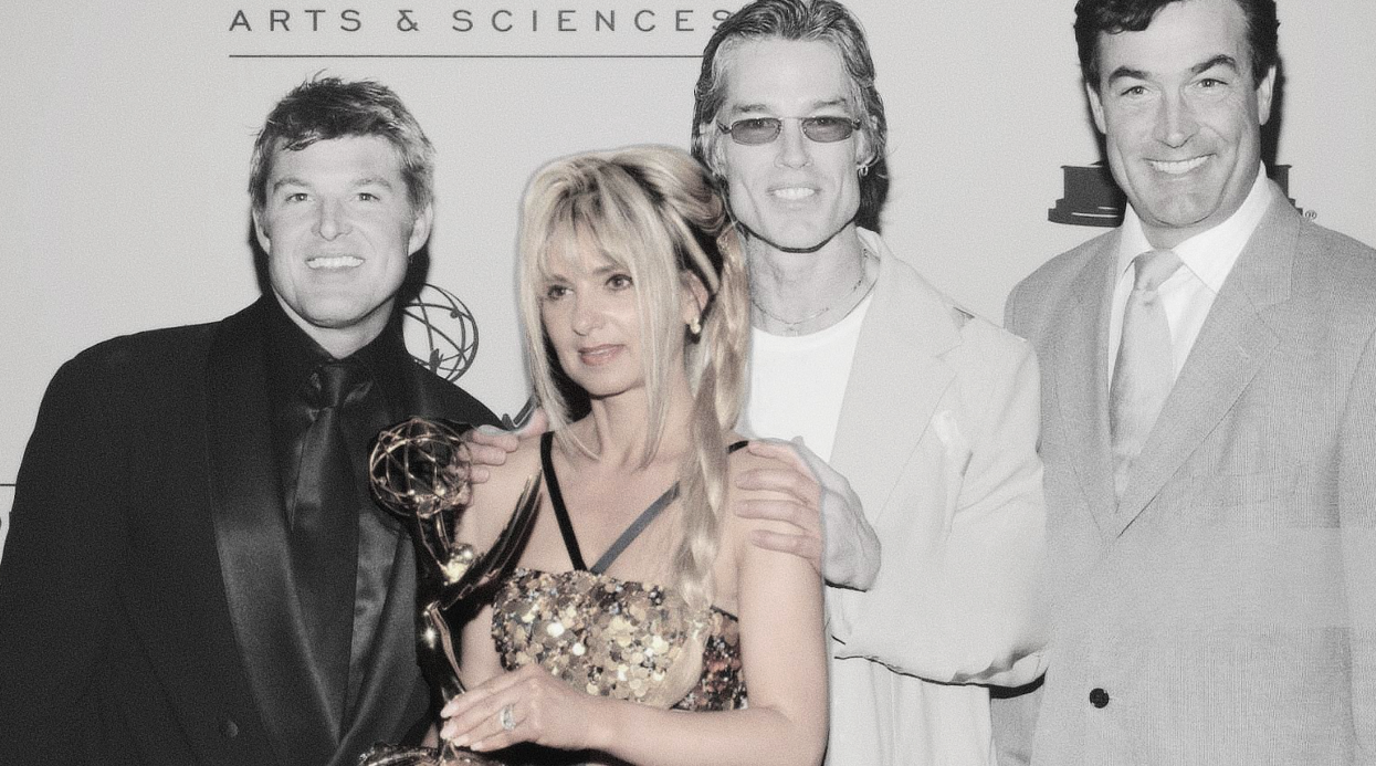 Birgit C. Müller holding a Daytime Emmy with colleagues
