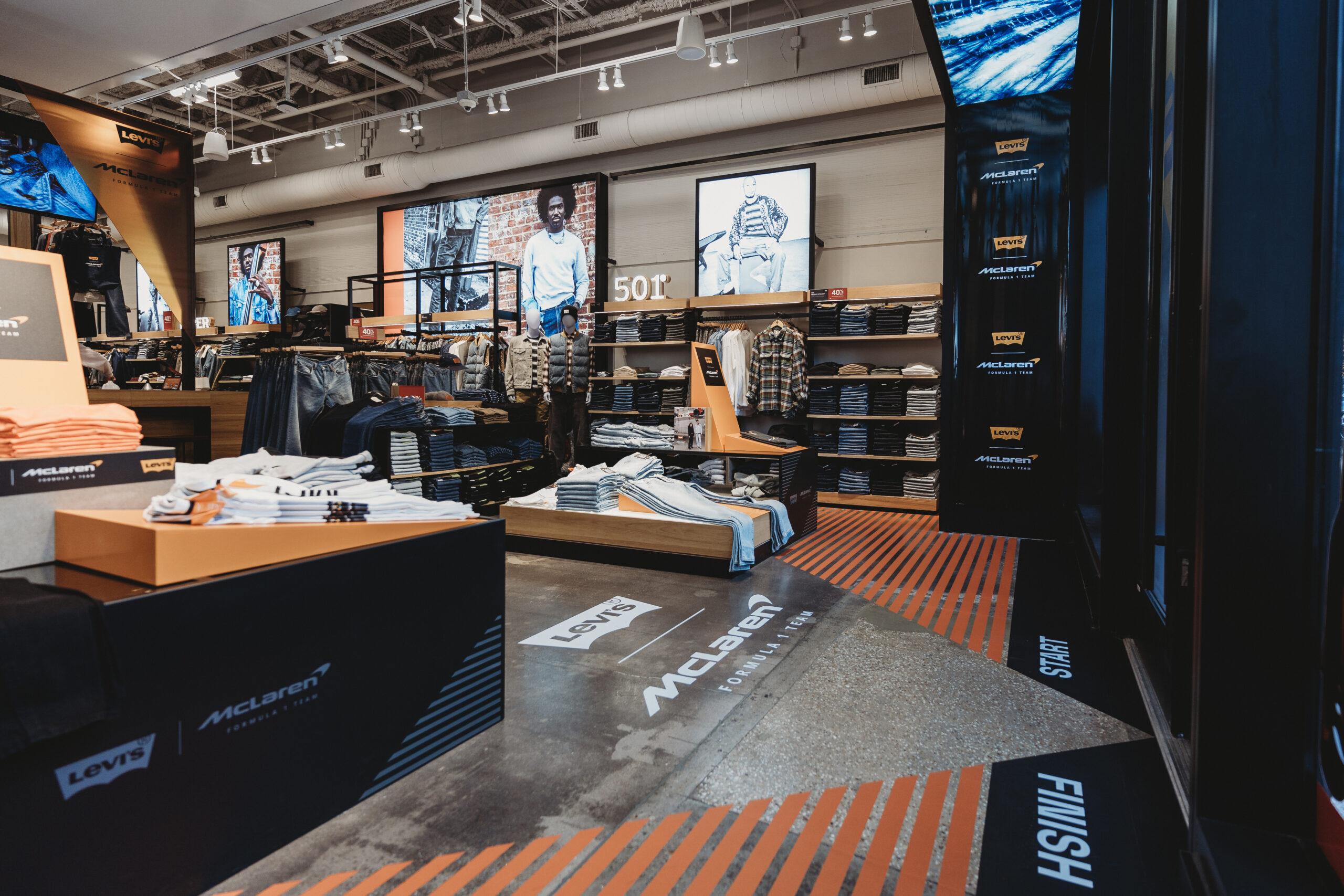 Levi's store interior transformed with McLaren pit lane floor graphics and clothing displays