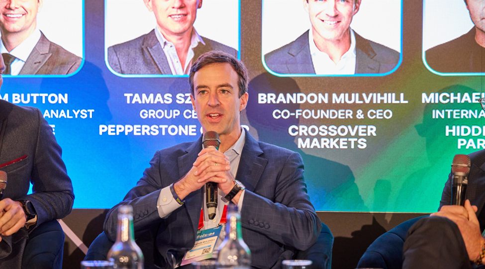 Brandon Mulvihill speaking on a panel at the Finance Magnates London Summit 2024