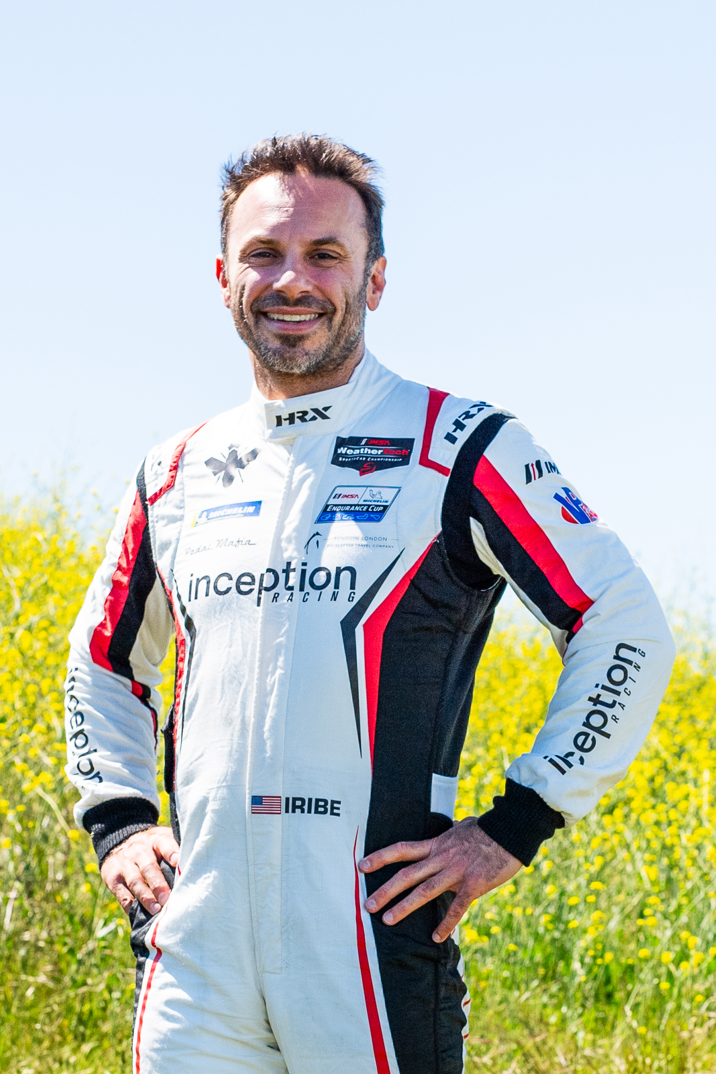 Brendan Iribe standing outdoors in his Inception Racing suit