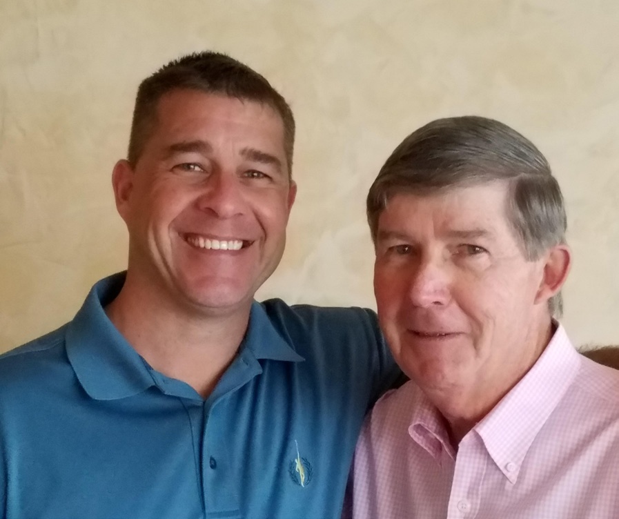 Brett Chisholm, left, with his father Thomas J. Chisholm