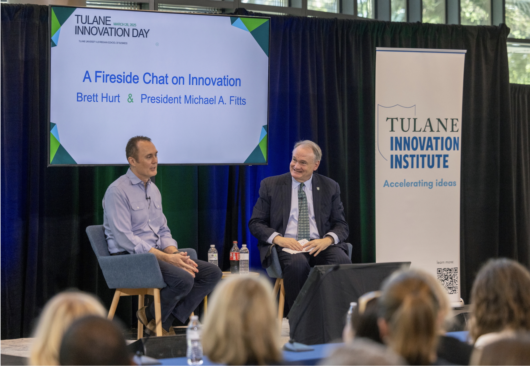 Brett Hurt, left, speaking with Tulane University president Michael A. Fitts at Tulane Innovation Day