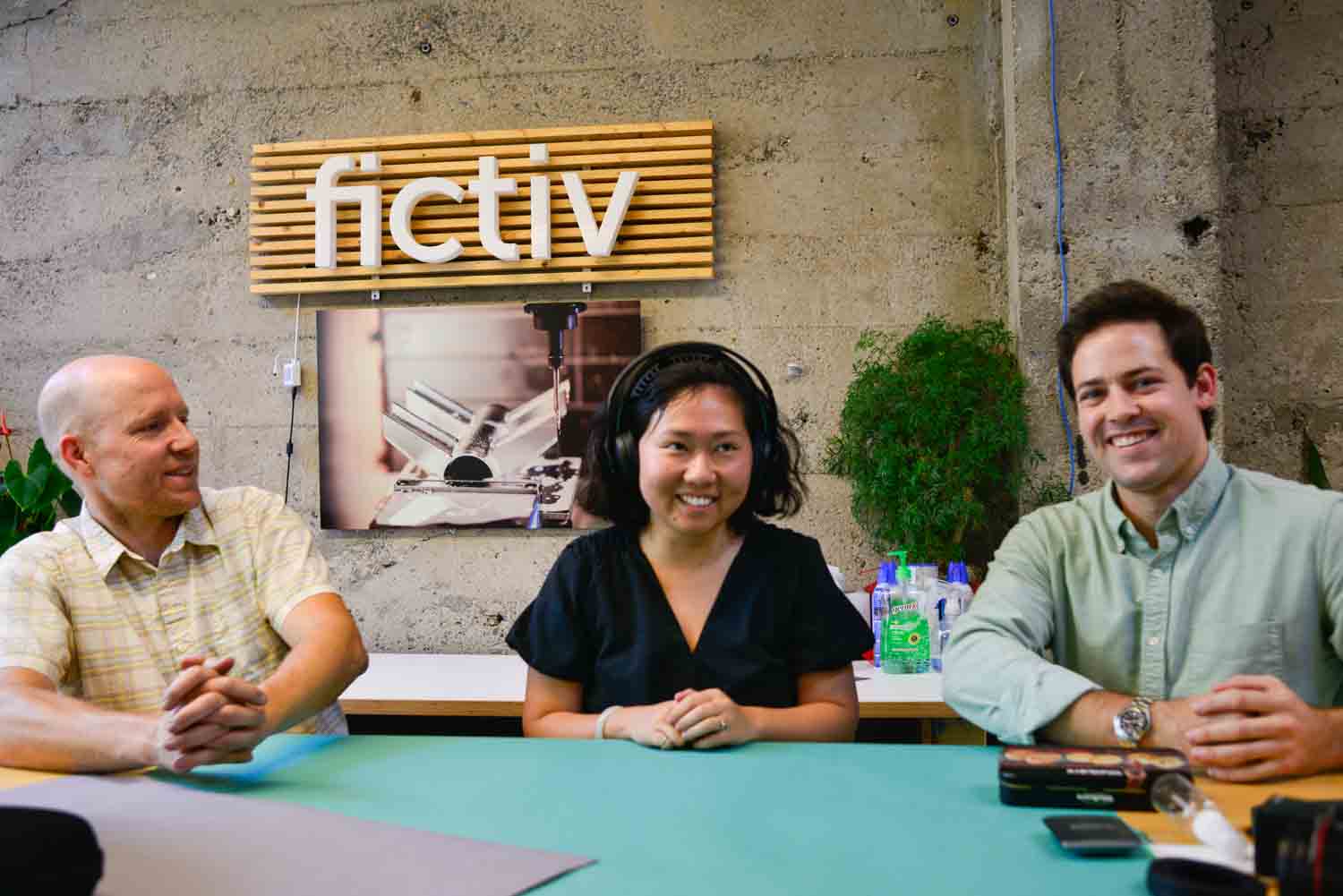Brett Wingeier on the left, Sylvia Wu in the center and Ian Shain on the right at a product teardown