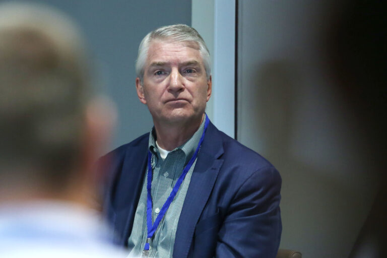 Brian Bird listening during the SDSU Land and Lending Conference in Sioux Falls