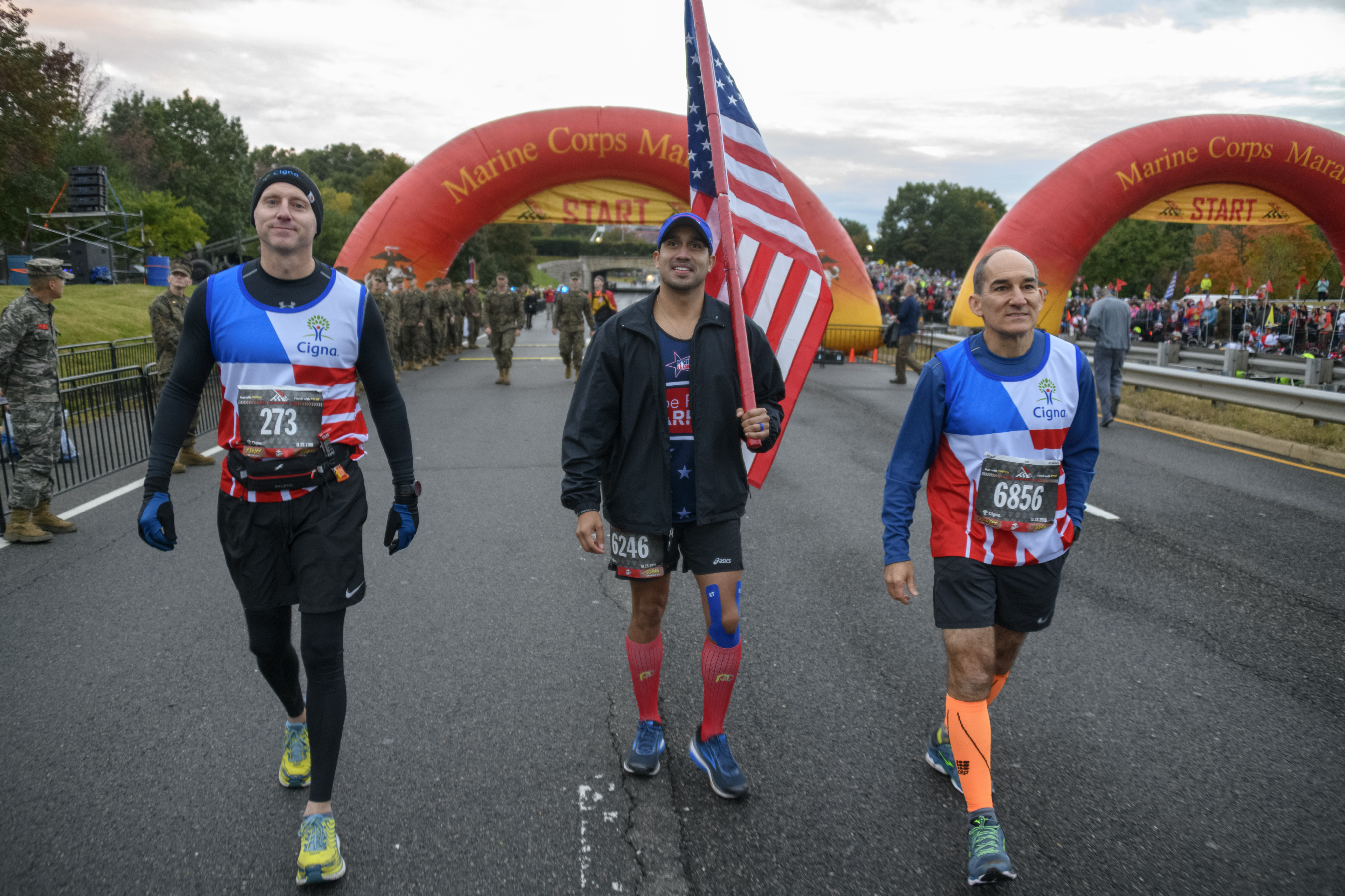 Brian Evanko on the left, Raymundo Soto in the center and Jeffrey Amell on the right at the 2018 Marine Corps Marathon