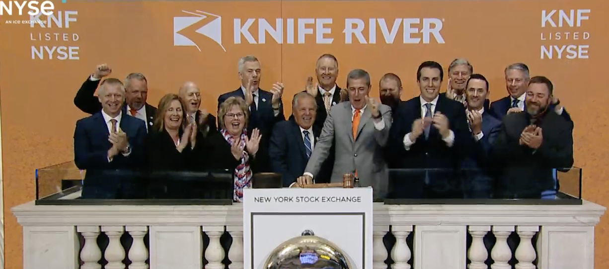 Knife River leaders celebrate at the New York Stock Exchange opening bell in June 2023