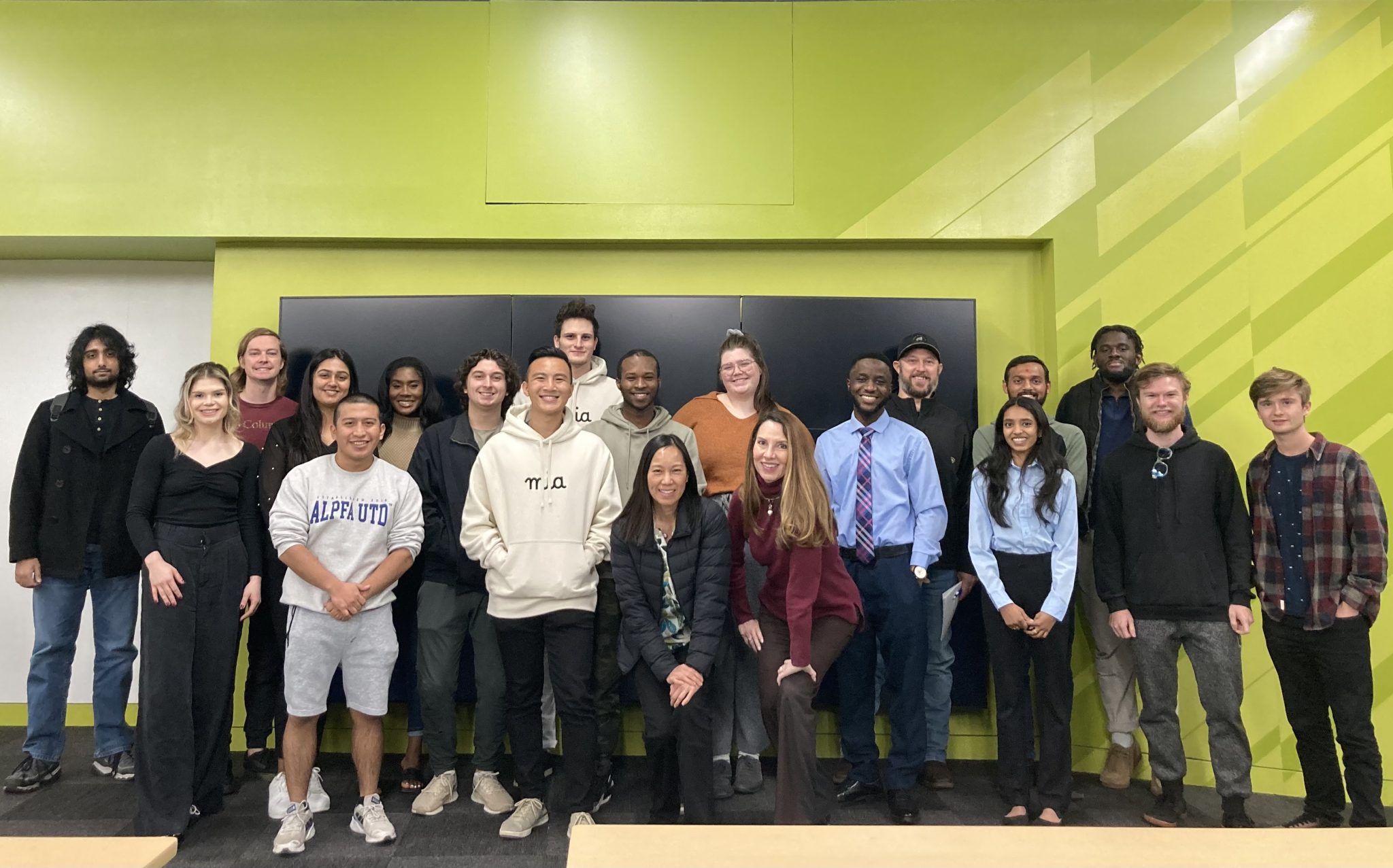 Brian Hoang standing with entrepreneurship students at UT Dallas