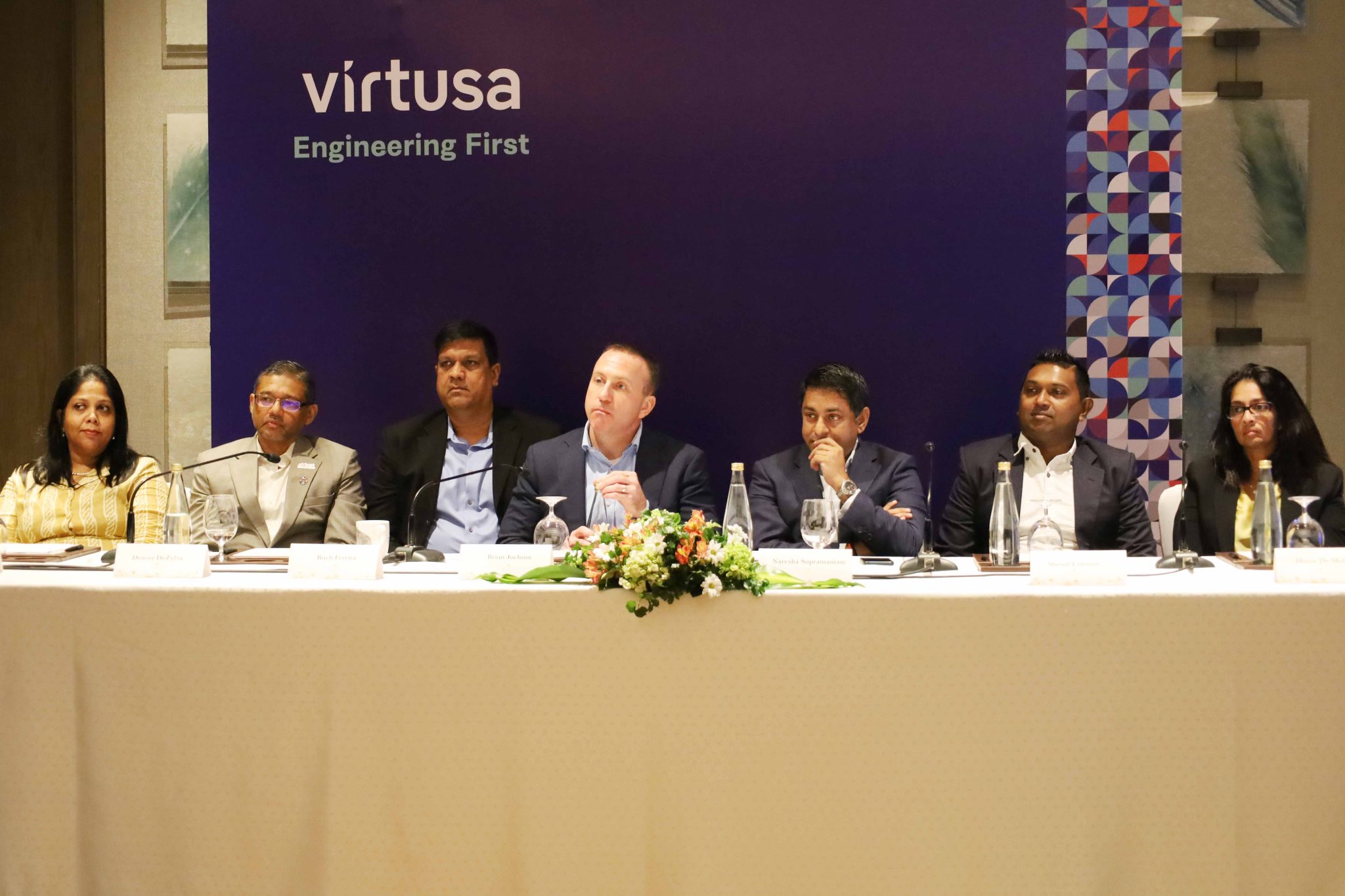 Brian Jochum speaking on a Virtusa panel in Sri Lanka with company leaders