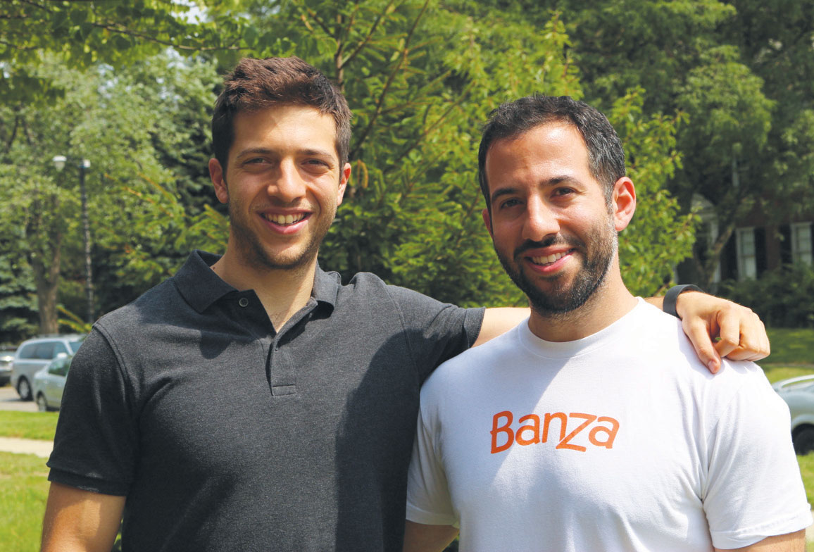 Brian Rudolph, left, and his brother Scott Rudolph standing together outdoors