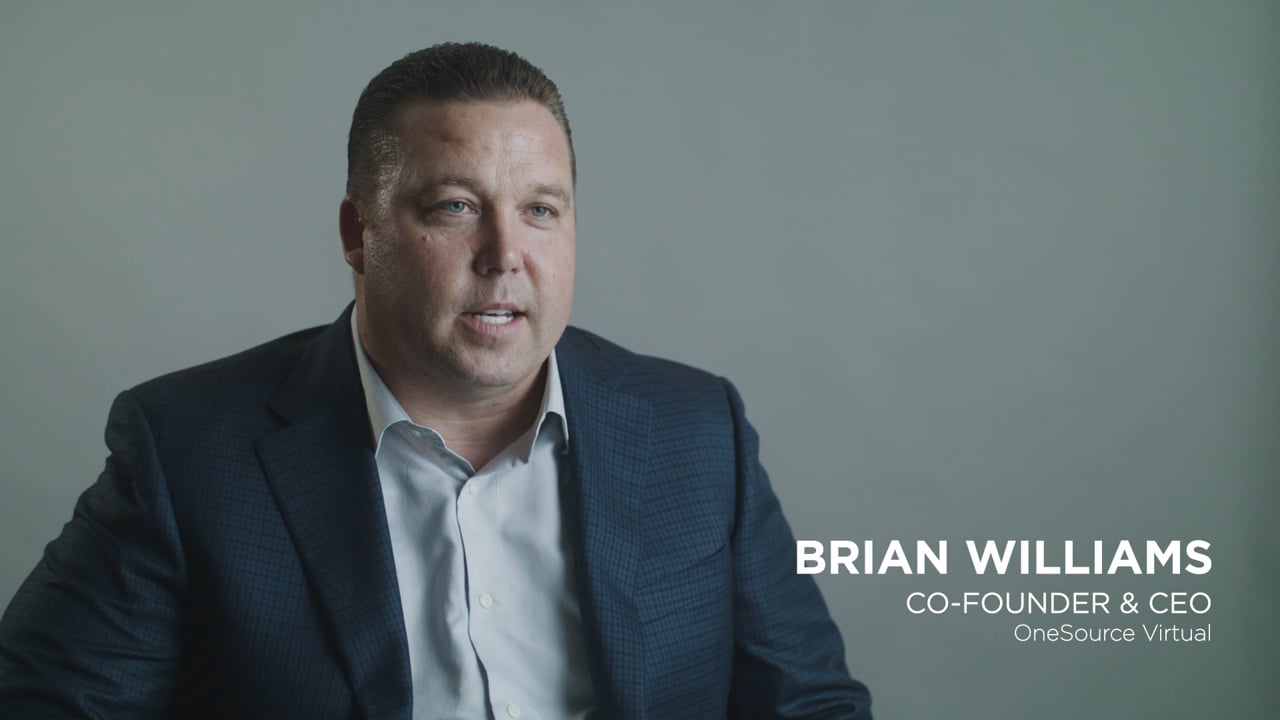 Brian Williams speaking in his 2017 founder interview, wearing a blue jacket