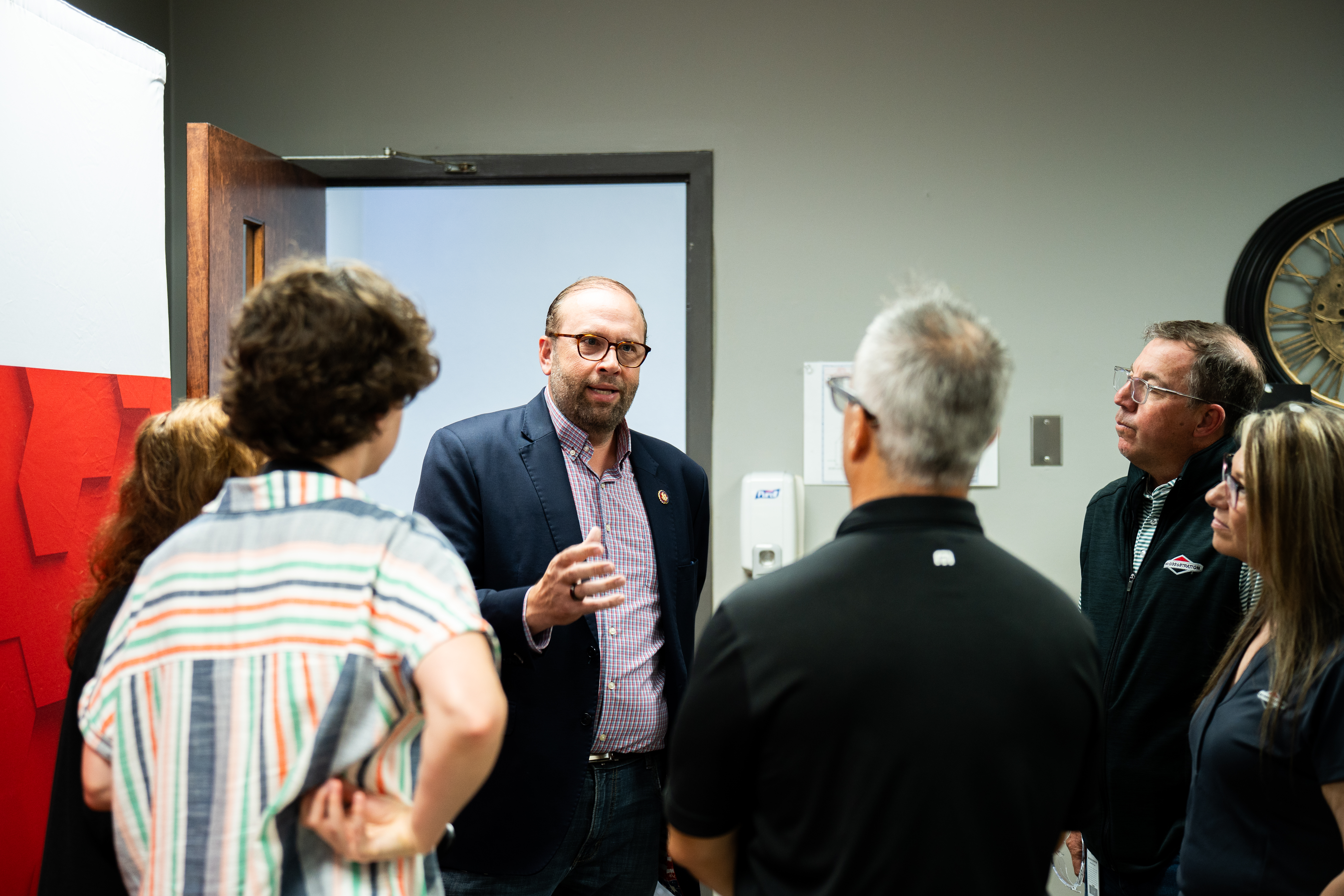 Visitors and Briggs & Stratton representatives gather during the Poplar Bluff milestone celebration.