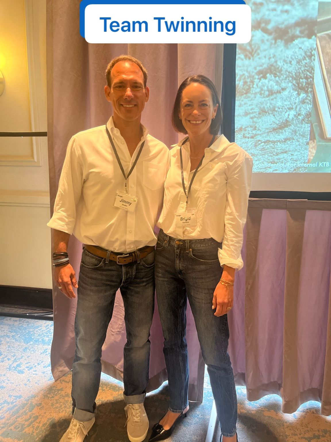 Brigid Stevens and Jimmy Shafer wearing matching white shirts and cuffed jeans at a Lee team presentation