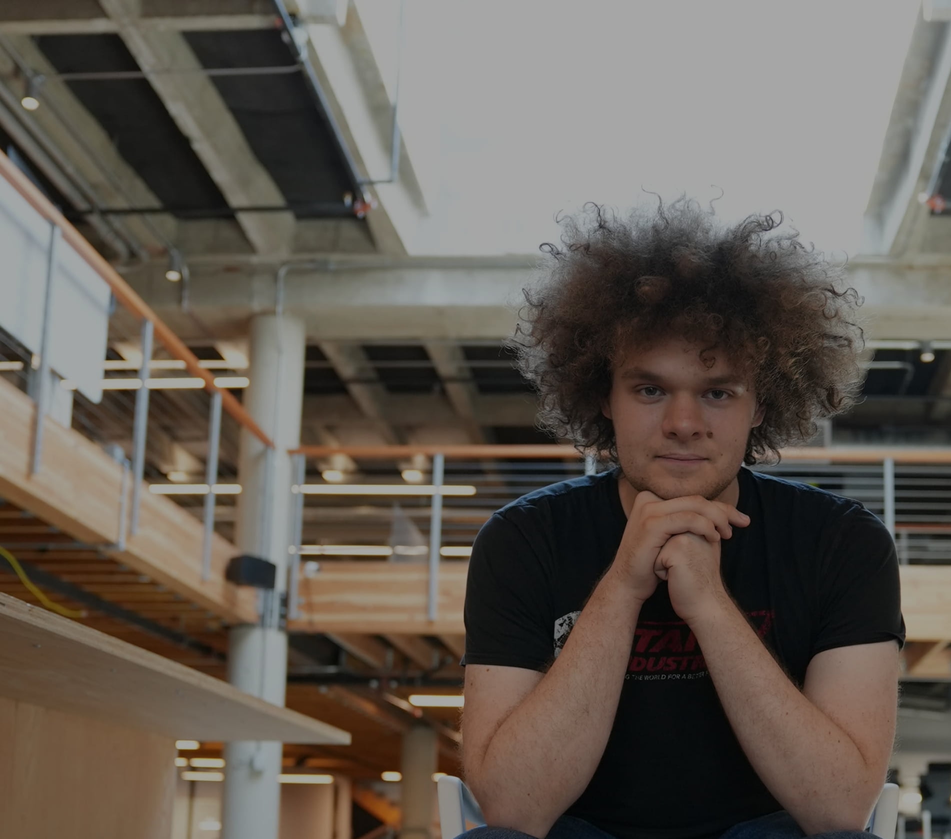BRINC founder Blake Resnick seated inside a workspace