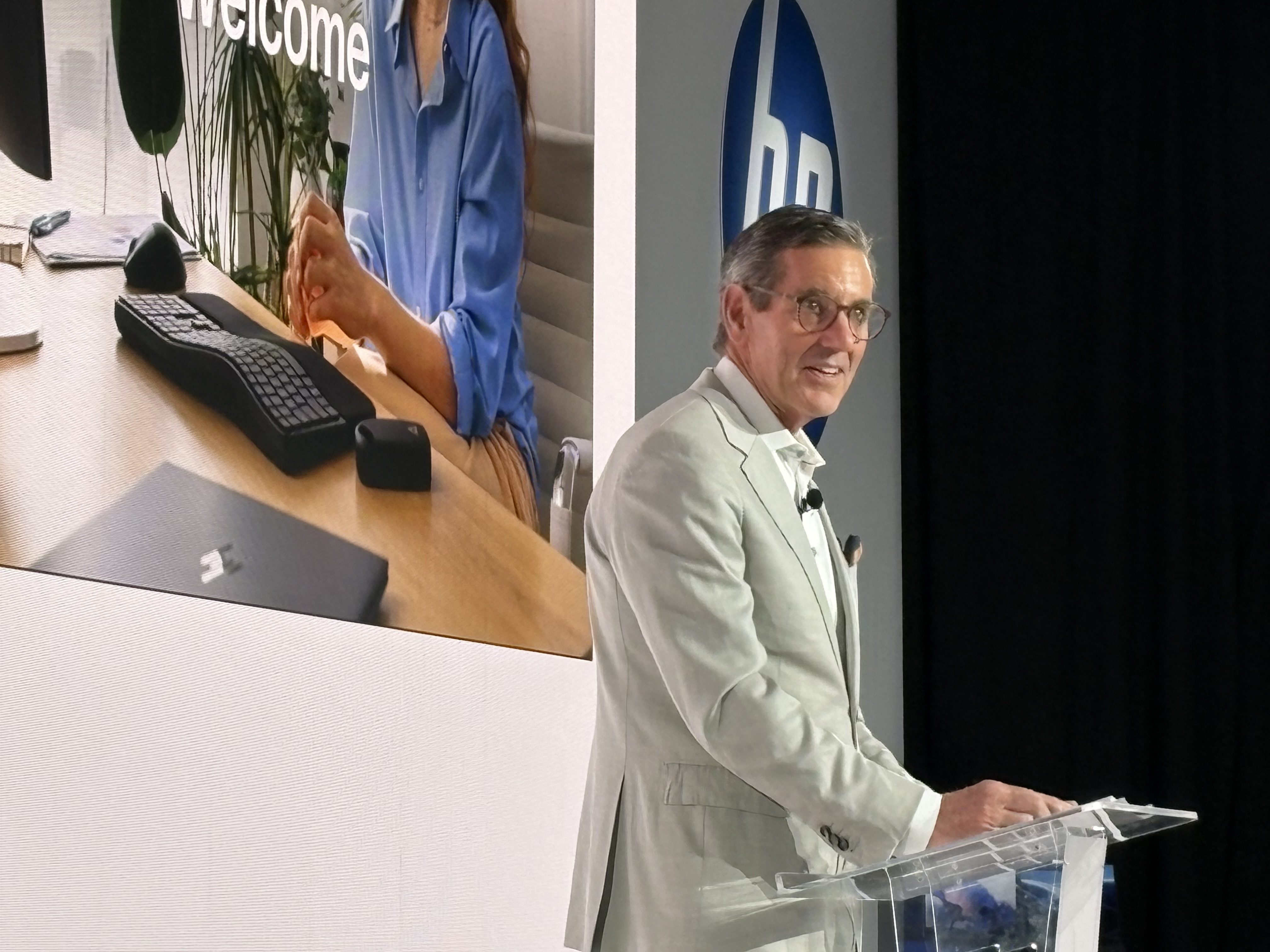 Bruce Broussard speaking at a lectern at HP Imagine in New York