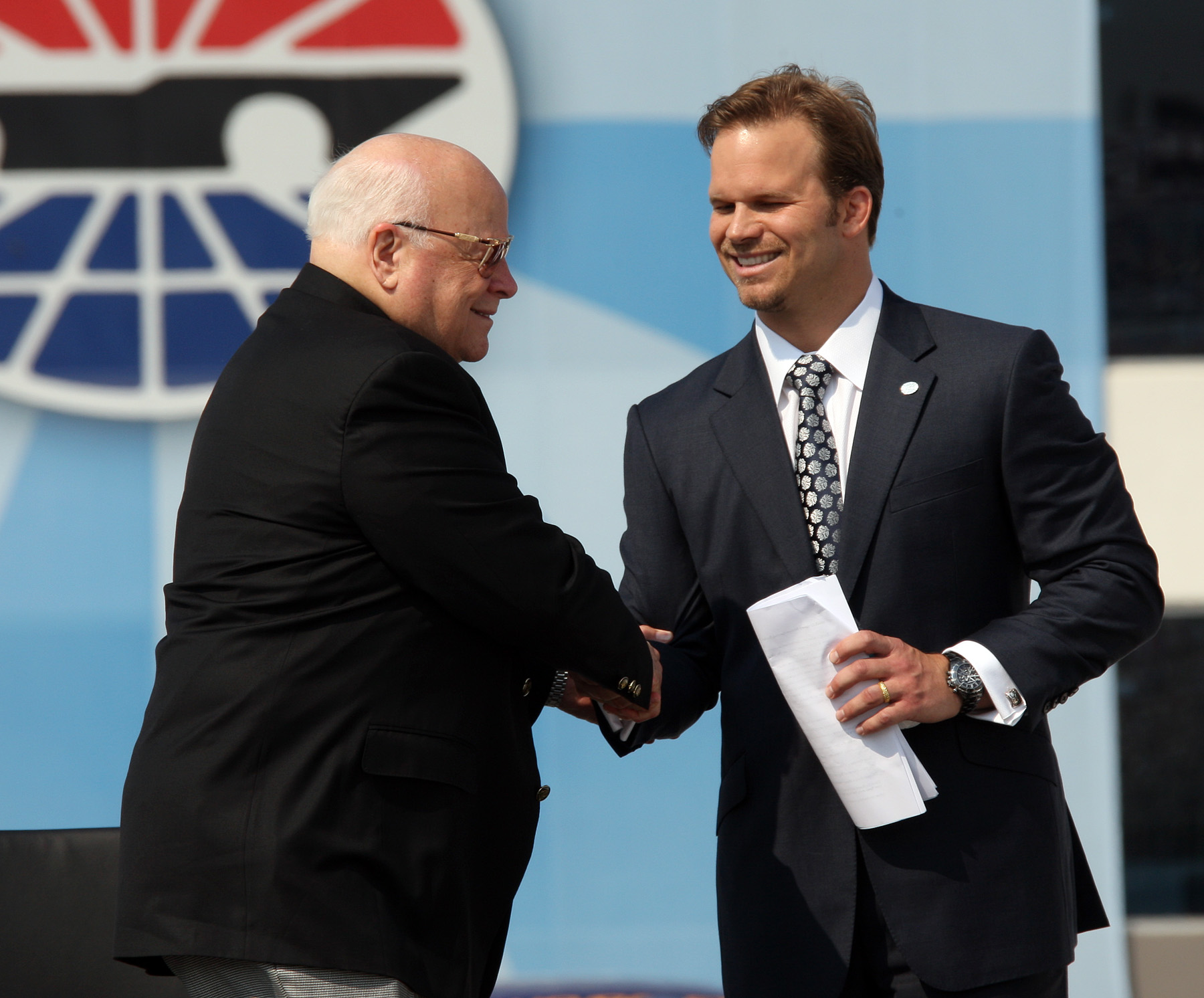 Bruton Smith with his son Marcus at the zMAX Dragway ribbon-cutting ceremony in August 2008.