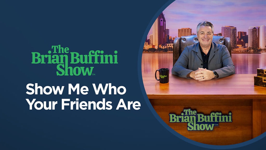 Brian Buffini seated at his show desk in an official promotional image