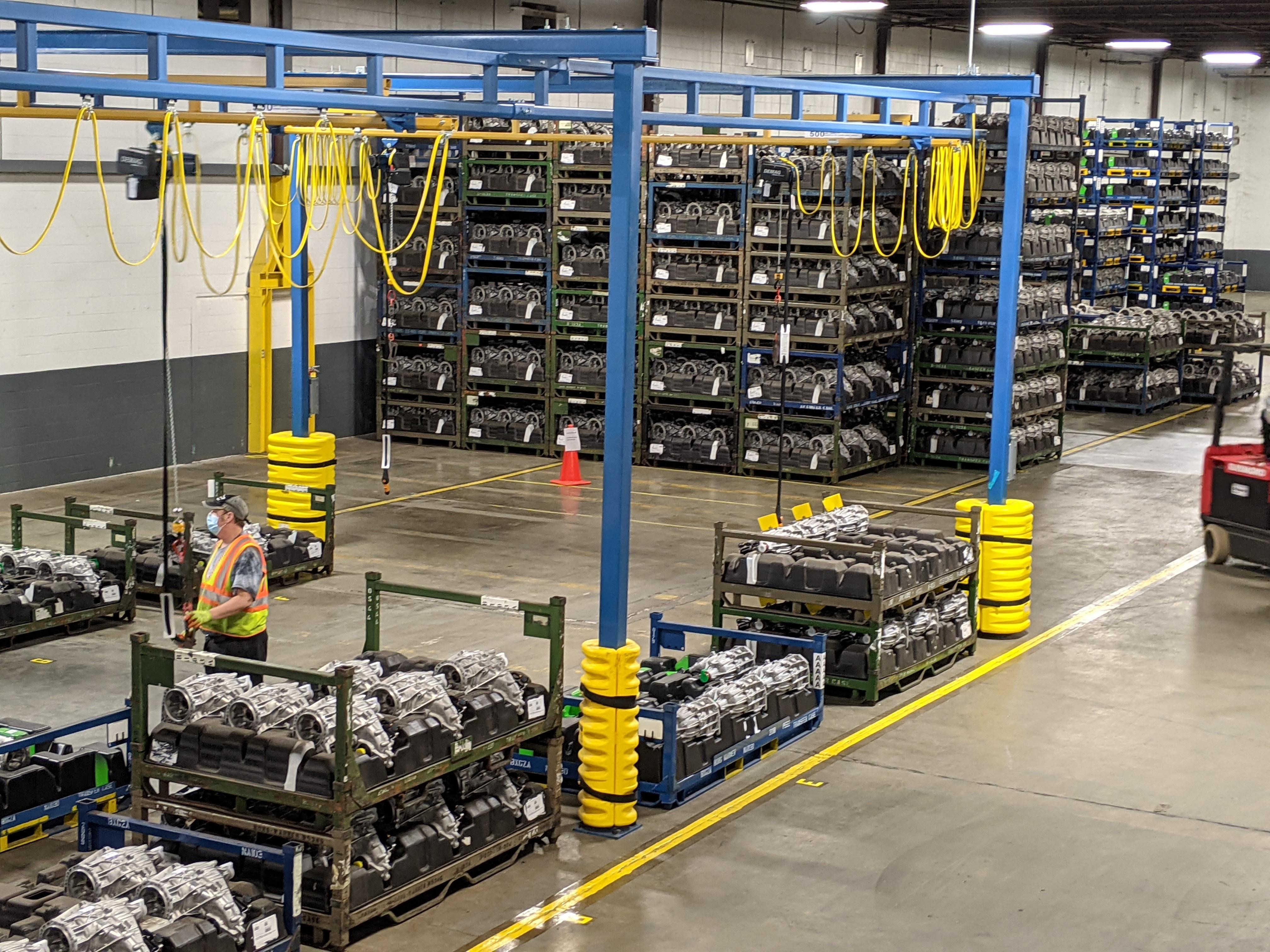 Racks of automotive components and handling equipment on Buske’s sequencing floor