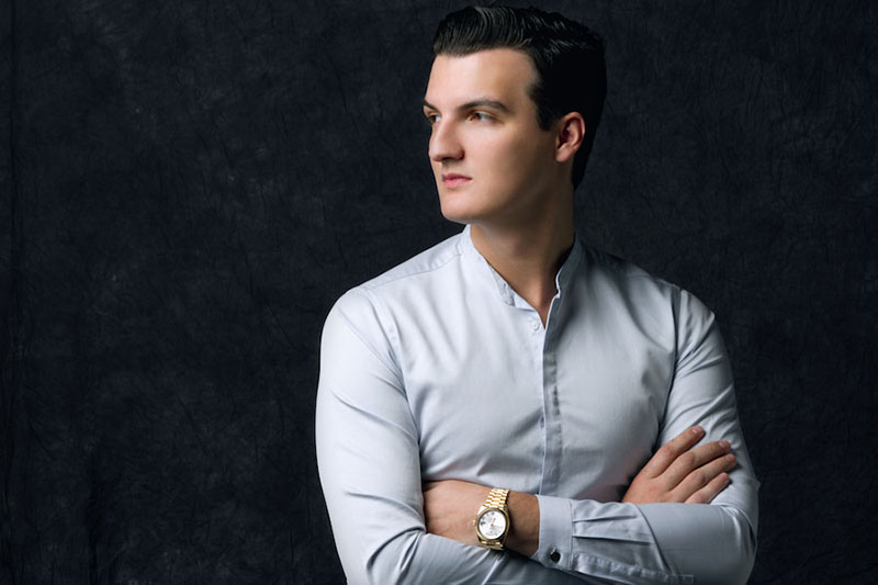 Butler Hospitality founder Premtim Tim Gjonbalic in a white shirt