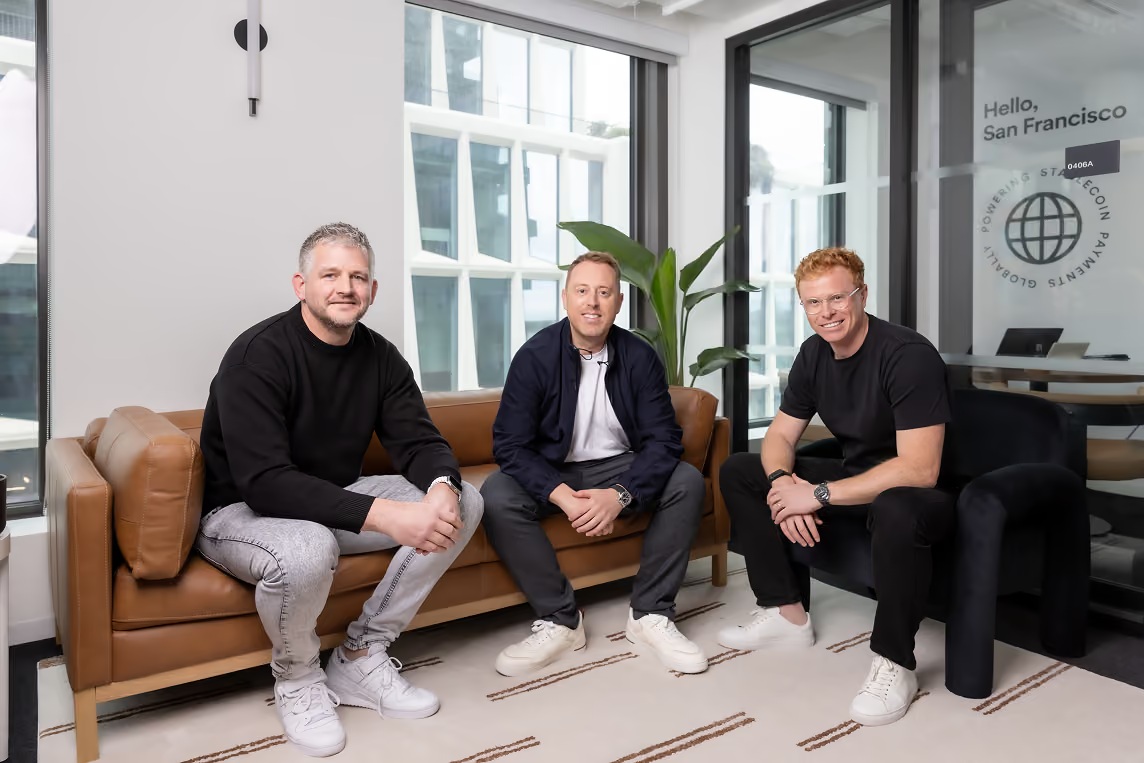 BVNK’s three co-founders seated together in an office