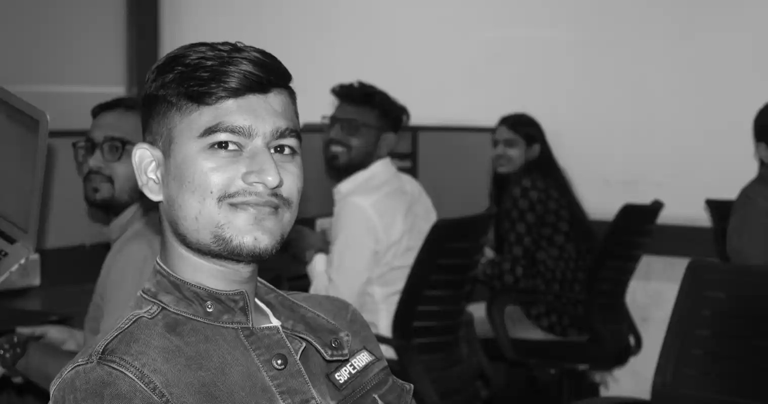 Members of the Bytes Technolab team seated at office workstations