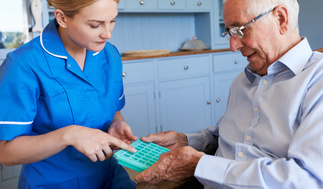 A C3 HealthcareRx nurse reviewing medications with a patient at home