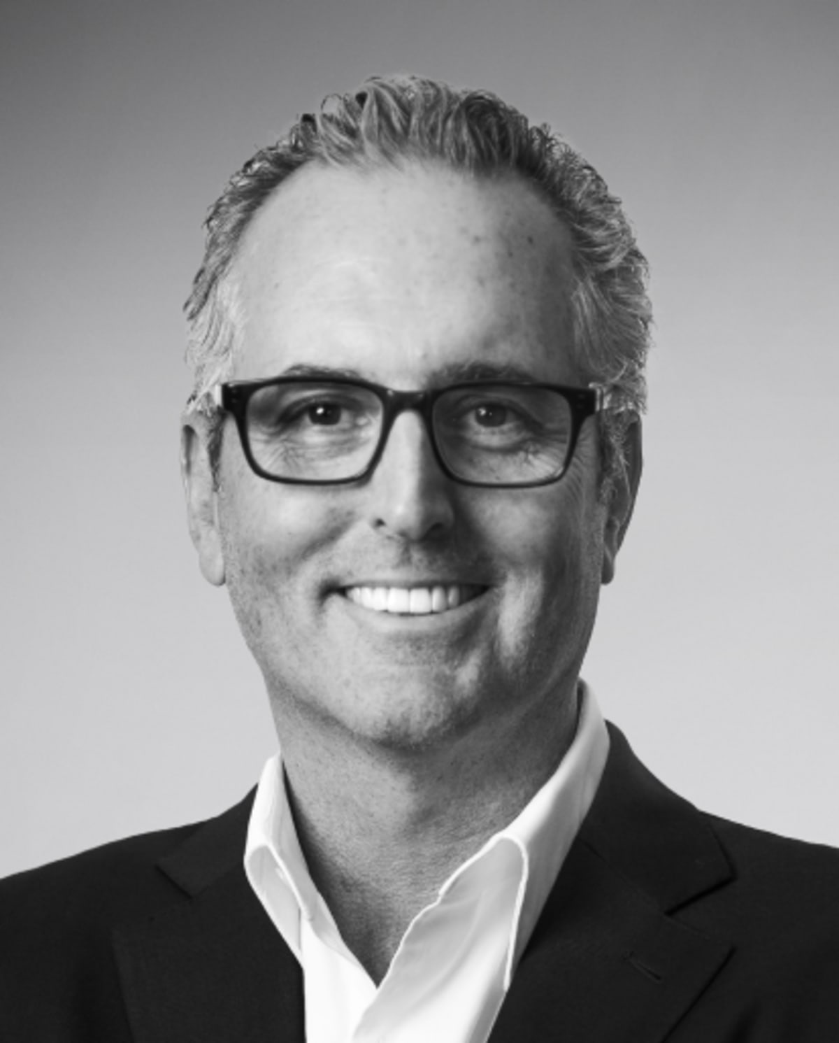 Black-and-white portrait of CAIS founder and CEO Matt Brown
