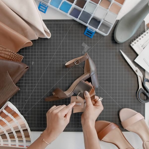 Footwear design workspace with material swatches and color samples