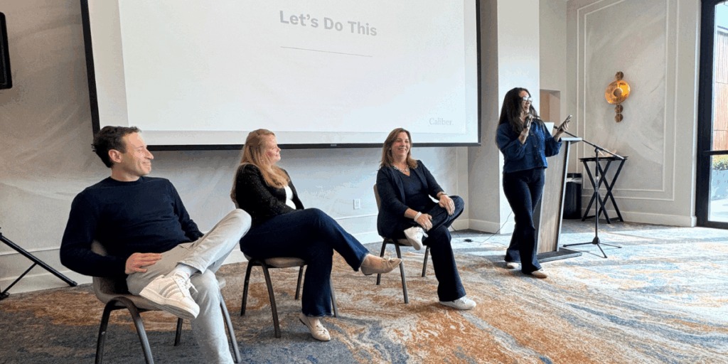Caliber Corporate Advisers team members in conversation at the 2025 Nashville offsite