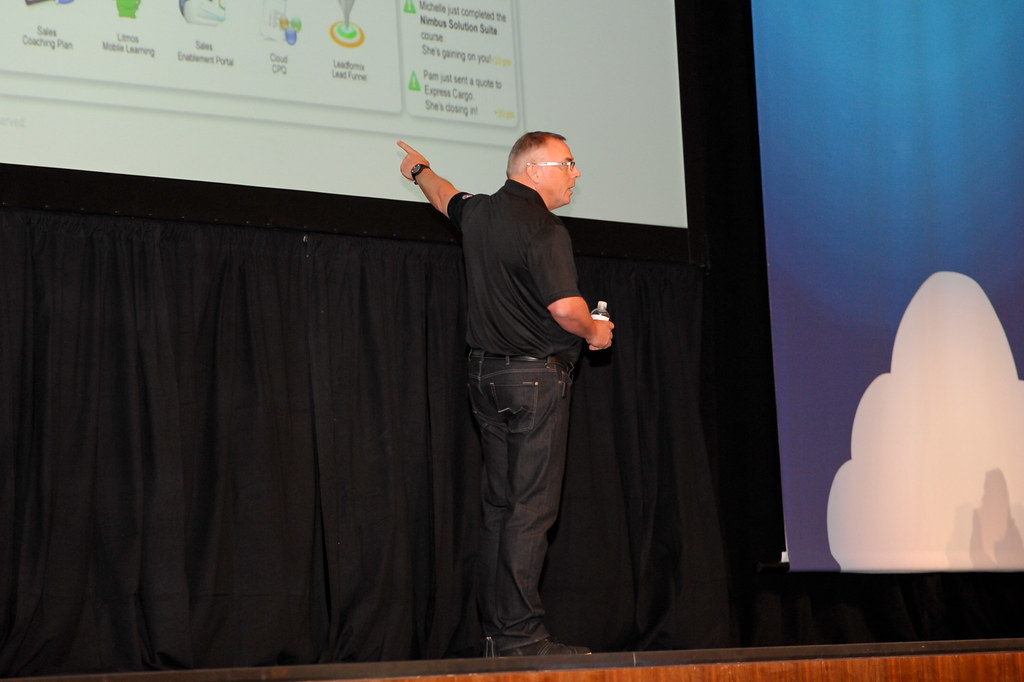 CallidusCloud CEO Leslie Stretch points to a projected product demonstration at C3 in 2012