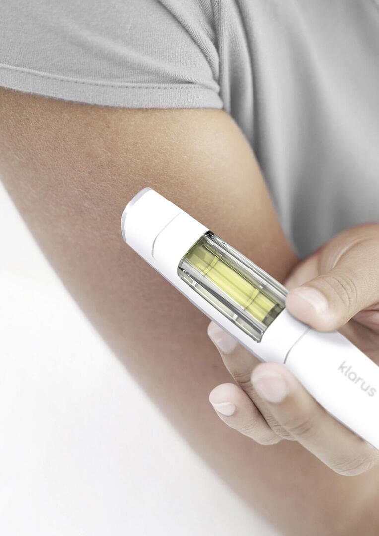 Klarus medical-device concept held against an upper arm