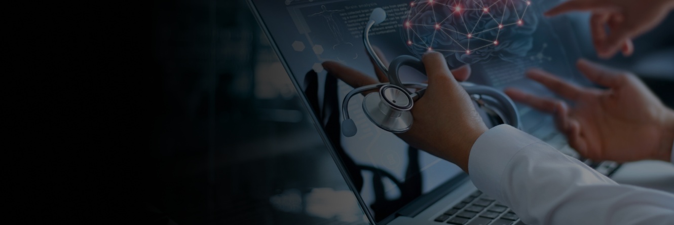 Healthcare illustration from Cambridge Technology’s patch-management case study, showing a clinician, stethoscope, and laptop