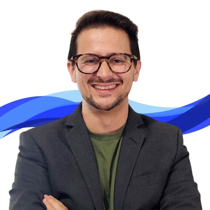Camilo Giraldo-Gallo wearing glasses and a jacket in GO Global Media’s CEO announcement portrait