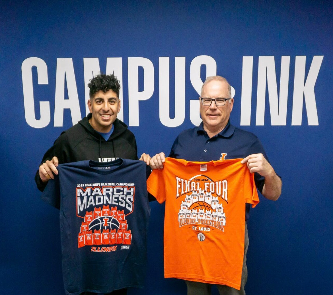 Steven Farag and Jedd Swisher hold Illinois shirts from 2025 and 2005