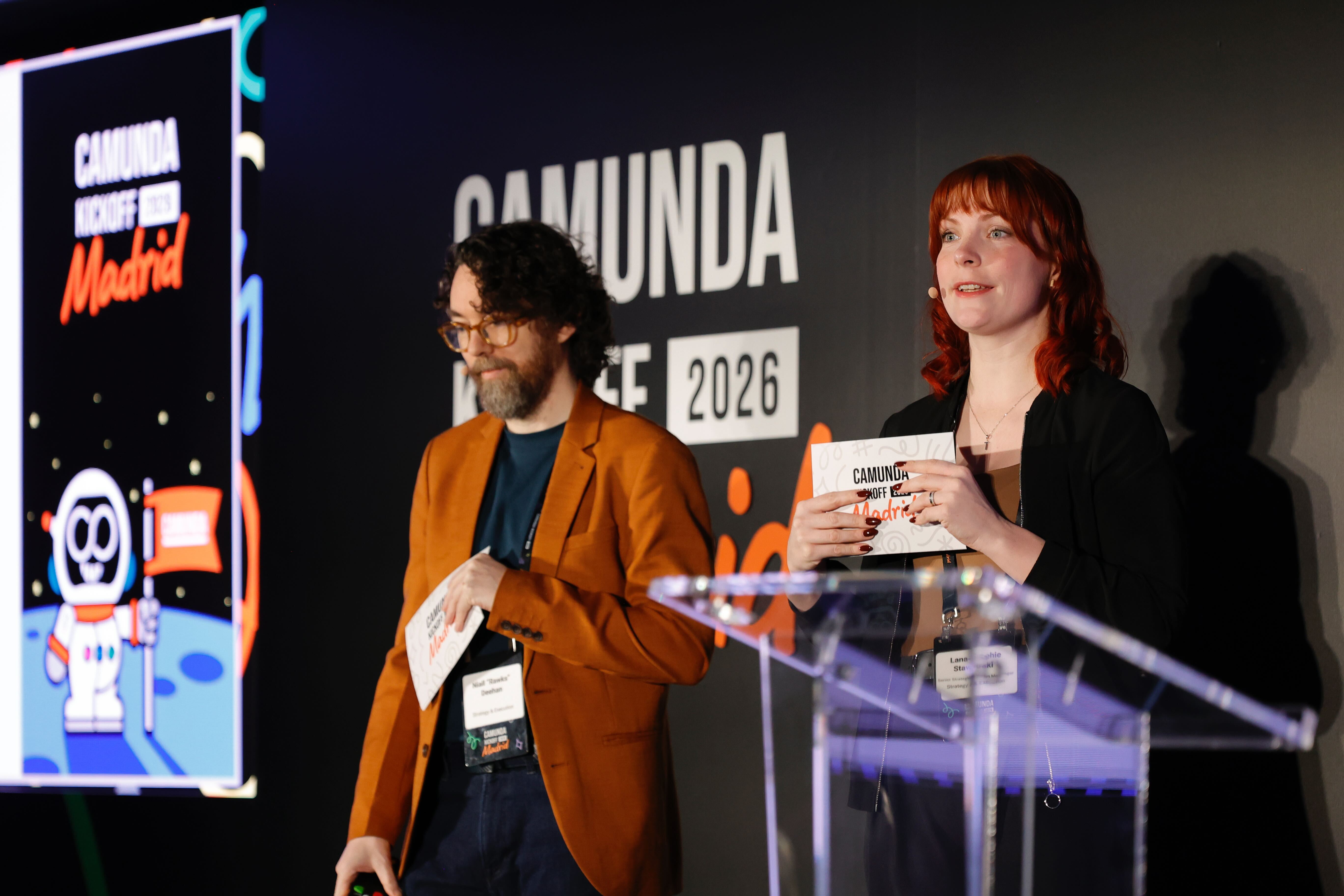 Two speakers onstage at Camunda Kickoff 2026 in Madrid