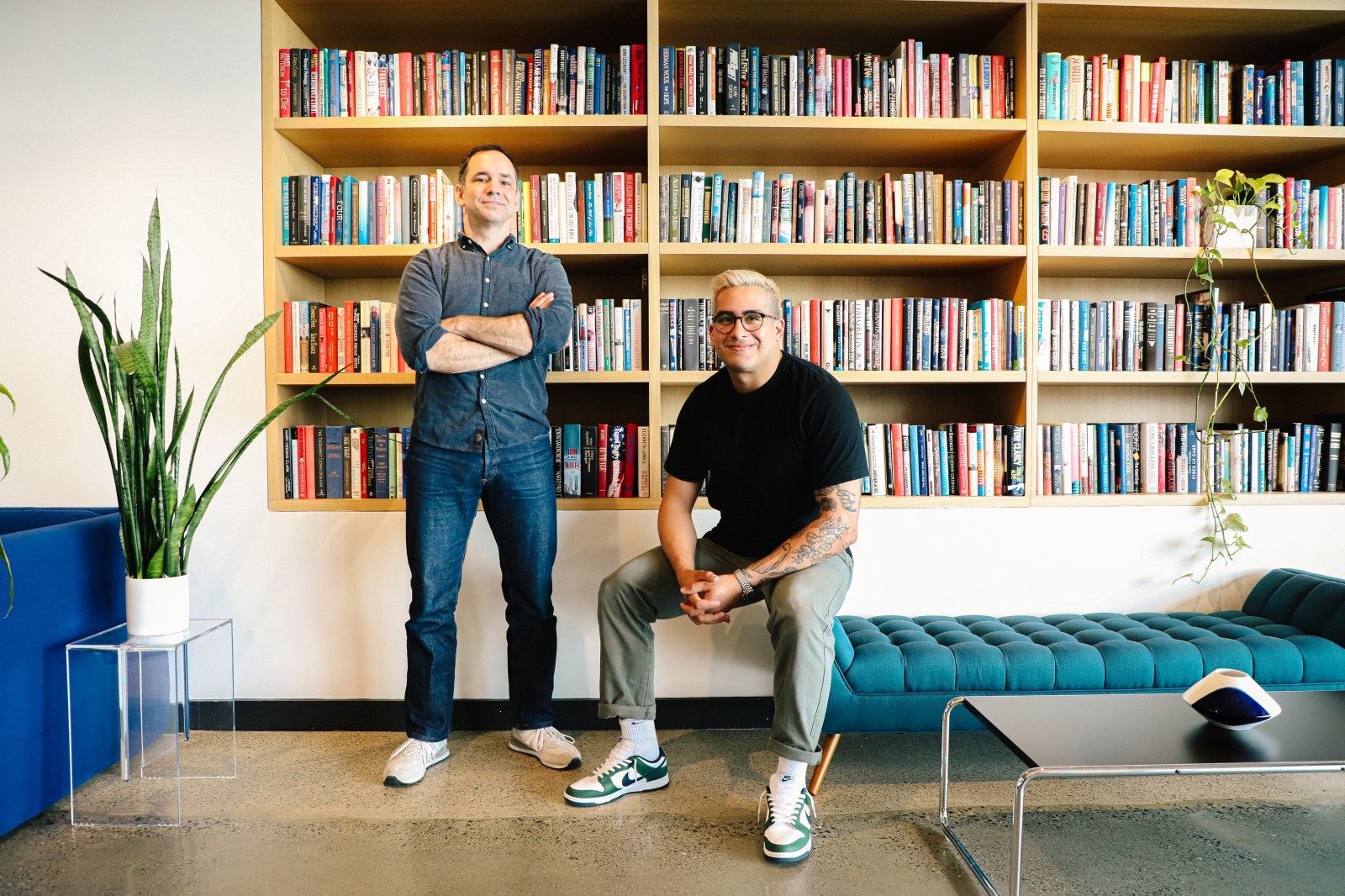 Cape co-founders John Doyle and Nicholas Espinoza in an office with bookshelves