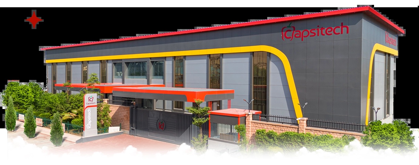 Capsitech Institute of Technology campus building with red roof trim and yellow facade detail