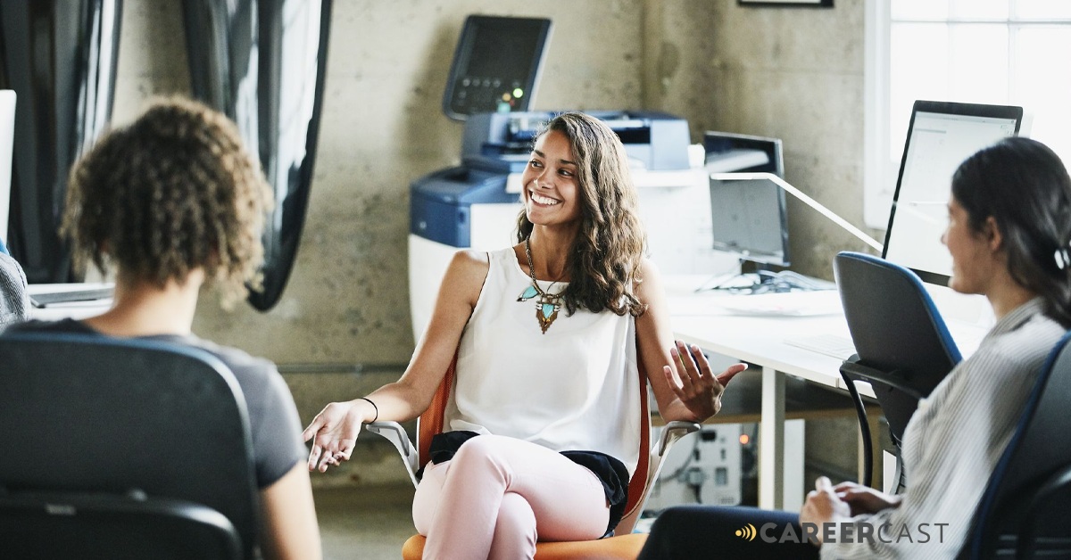 CareerCast editorial image of three people talking in an office