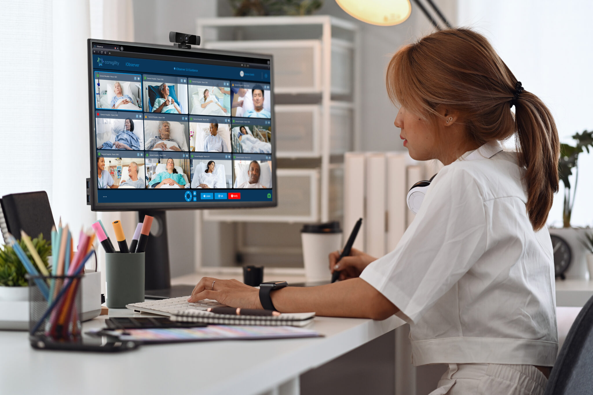A clinician uses Caregility iObserver to monitor multiple hospital patients on one screen