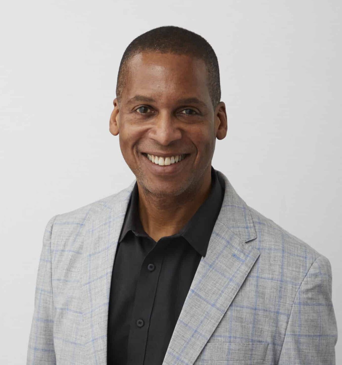 CareHive founder and CEO Ronald Dixon in a gray jacket