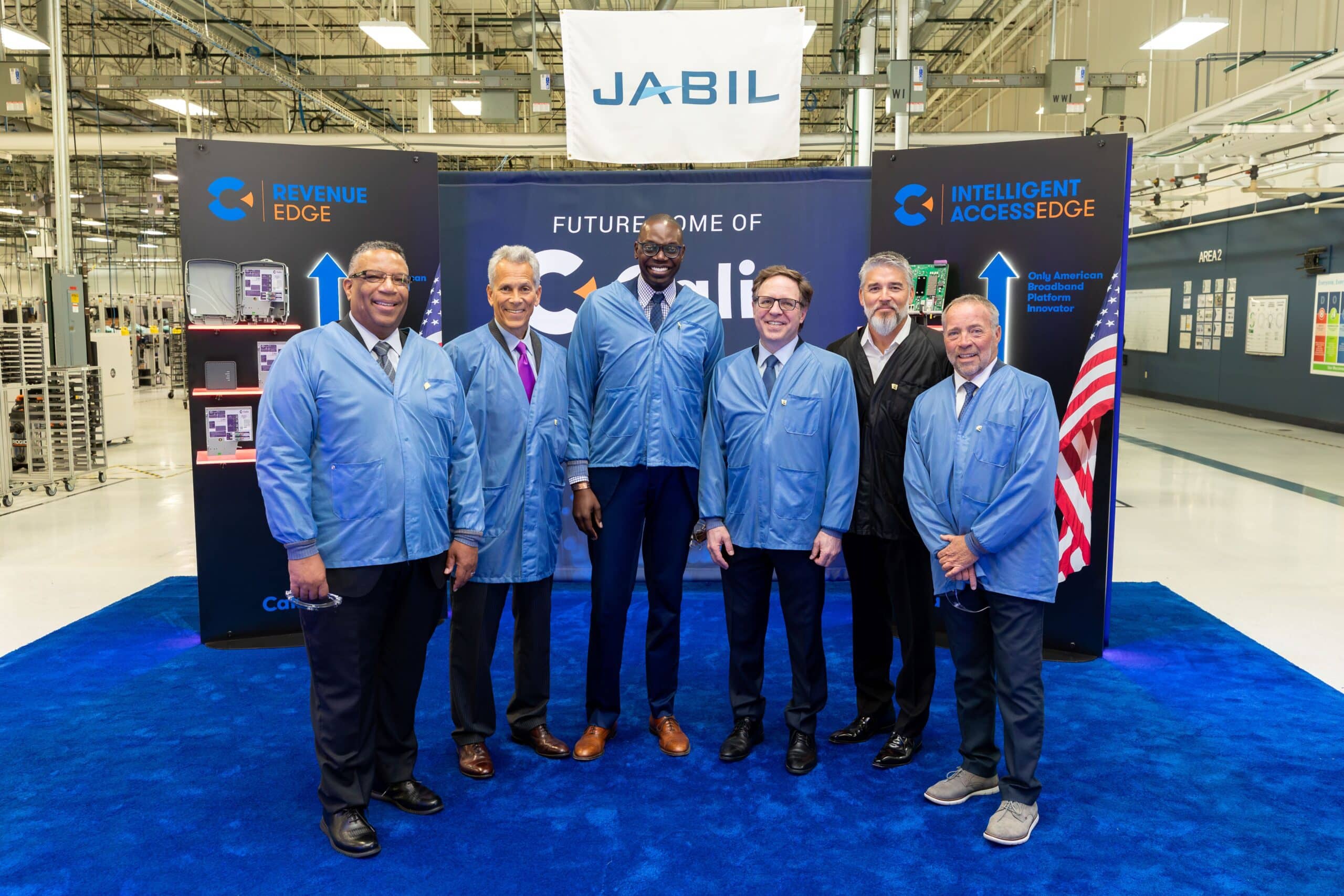 Carl Russo, second from left, with public officials and business leaders at Jabil’s Auburn Hills manufacturing facility