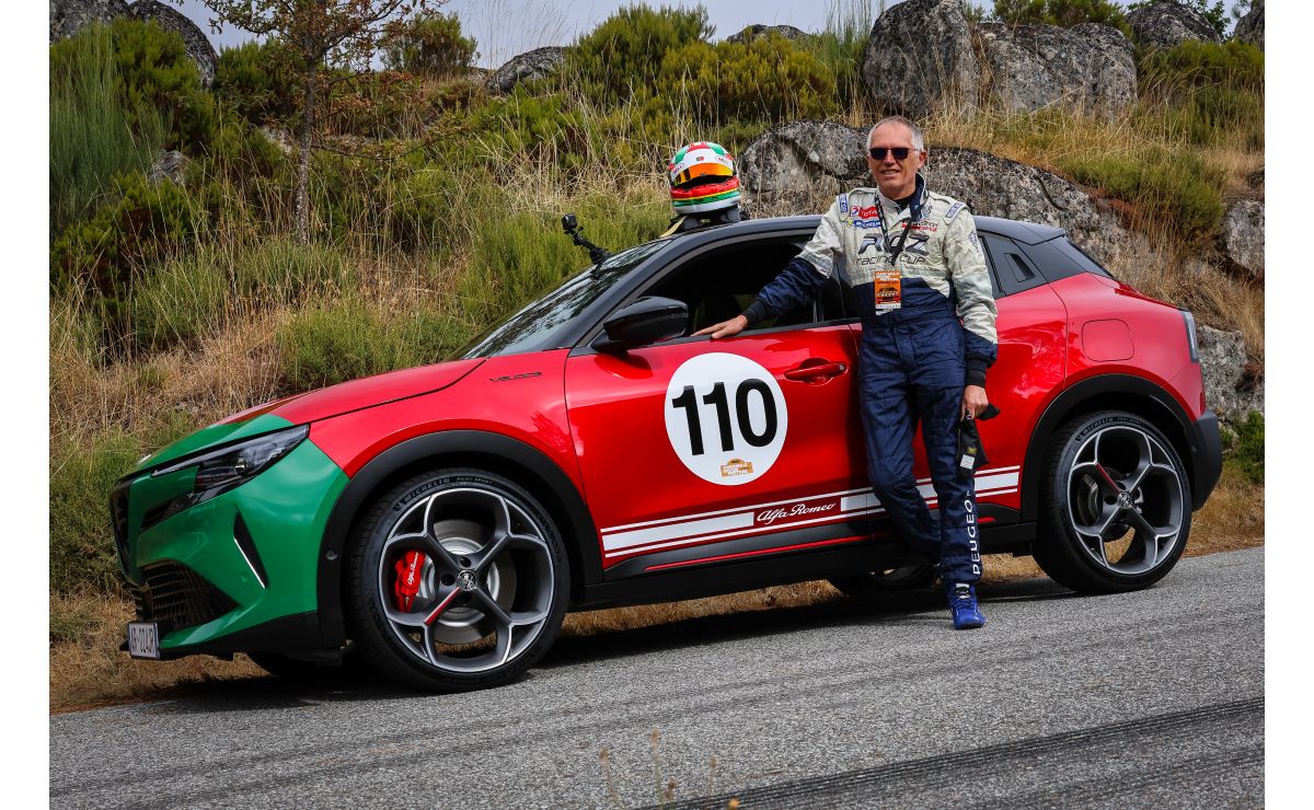 Carlos Tavares in a racing suit beside an Alfa Romeo Junior at Caramulo