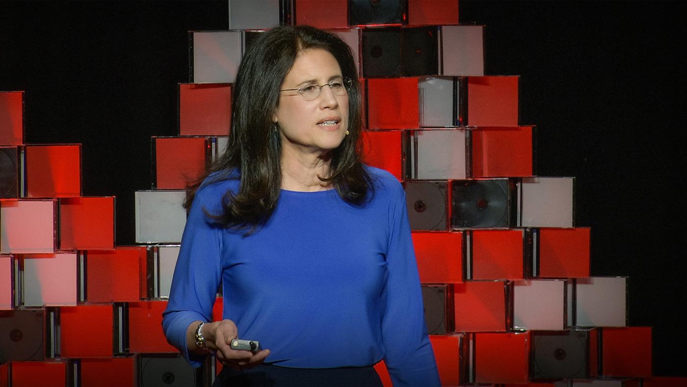 Carol Fishman Cohen speaking on the TEDxBeaconStreet stage