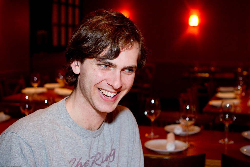 A young Carter Cleveland smiling at an early technology gathering