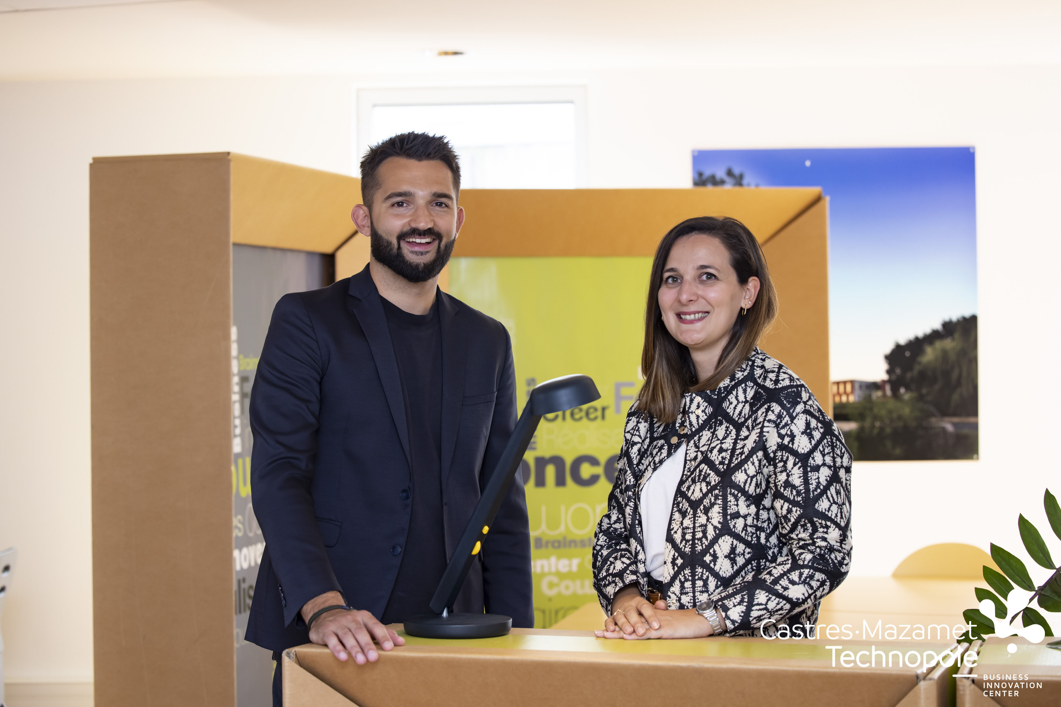 POLUX entrepreneurs Paul Dupeyre and Marion Guiraud with their desk lamp